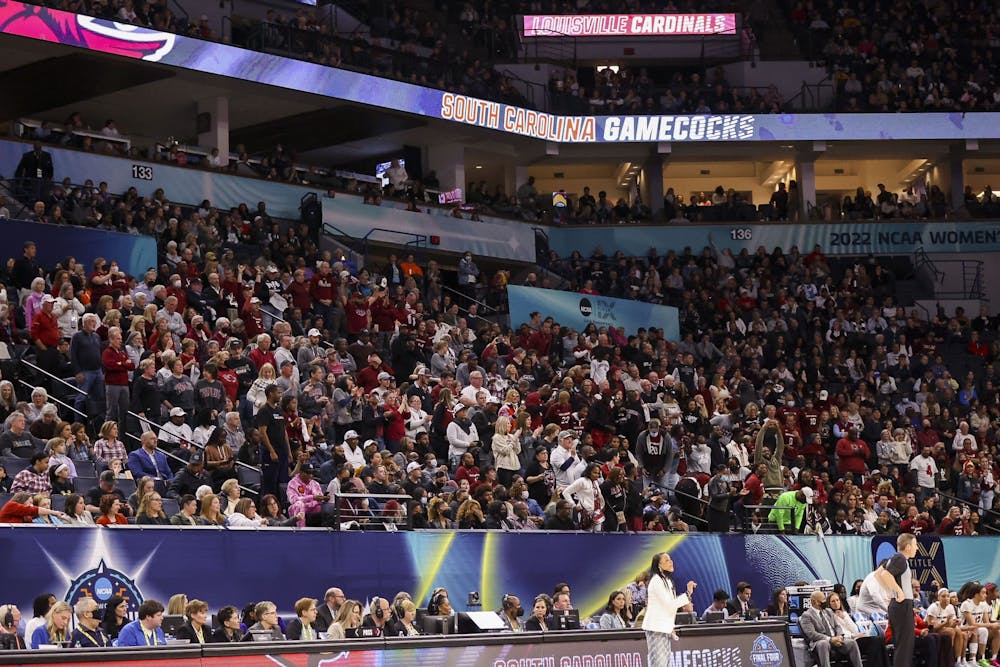 <p>South Carolina fans filled the section behind the Gamecocks bench during South Carolina's 72-59 victory over Louisville on April 1, 2022. South Carolina advanced to play in the national championship game with the win.</p>