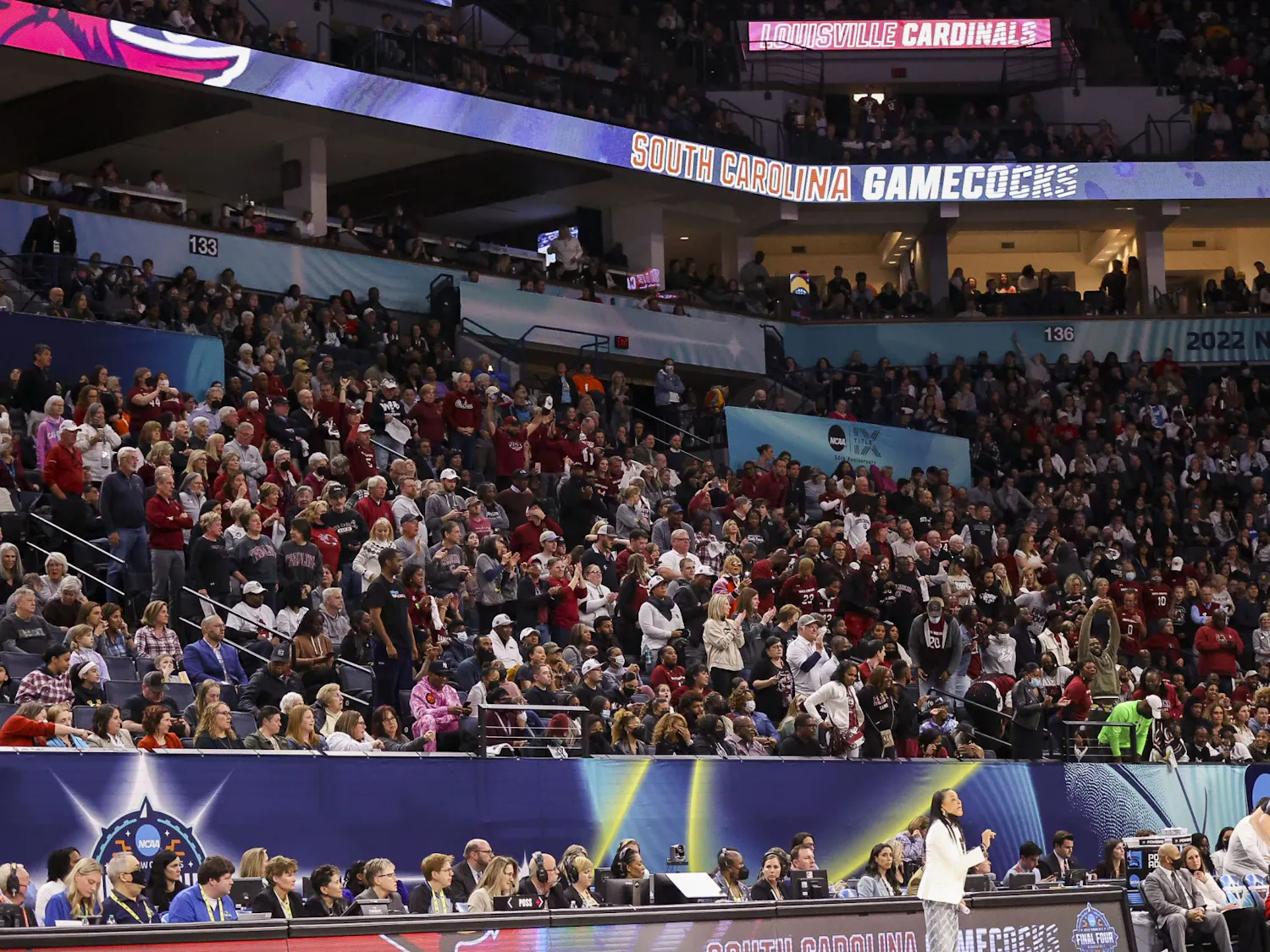 South Carolina fans filled the section behind the Gamecocks bench during South Carolina's 72-59 victory over Louisville on April 1, 2022. South Carolina advanced to play in the national championship game with the win.