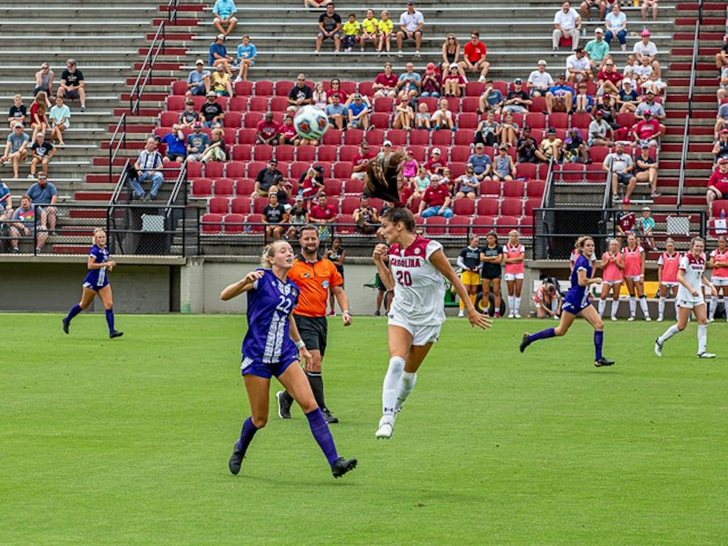 Junior Forward Corinna Zullo heads the ball to a teammate during South Carolina's game against East Carolina on August 21,2022. The Gamecocks beat the Pirates 2-0.&nbsp;