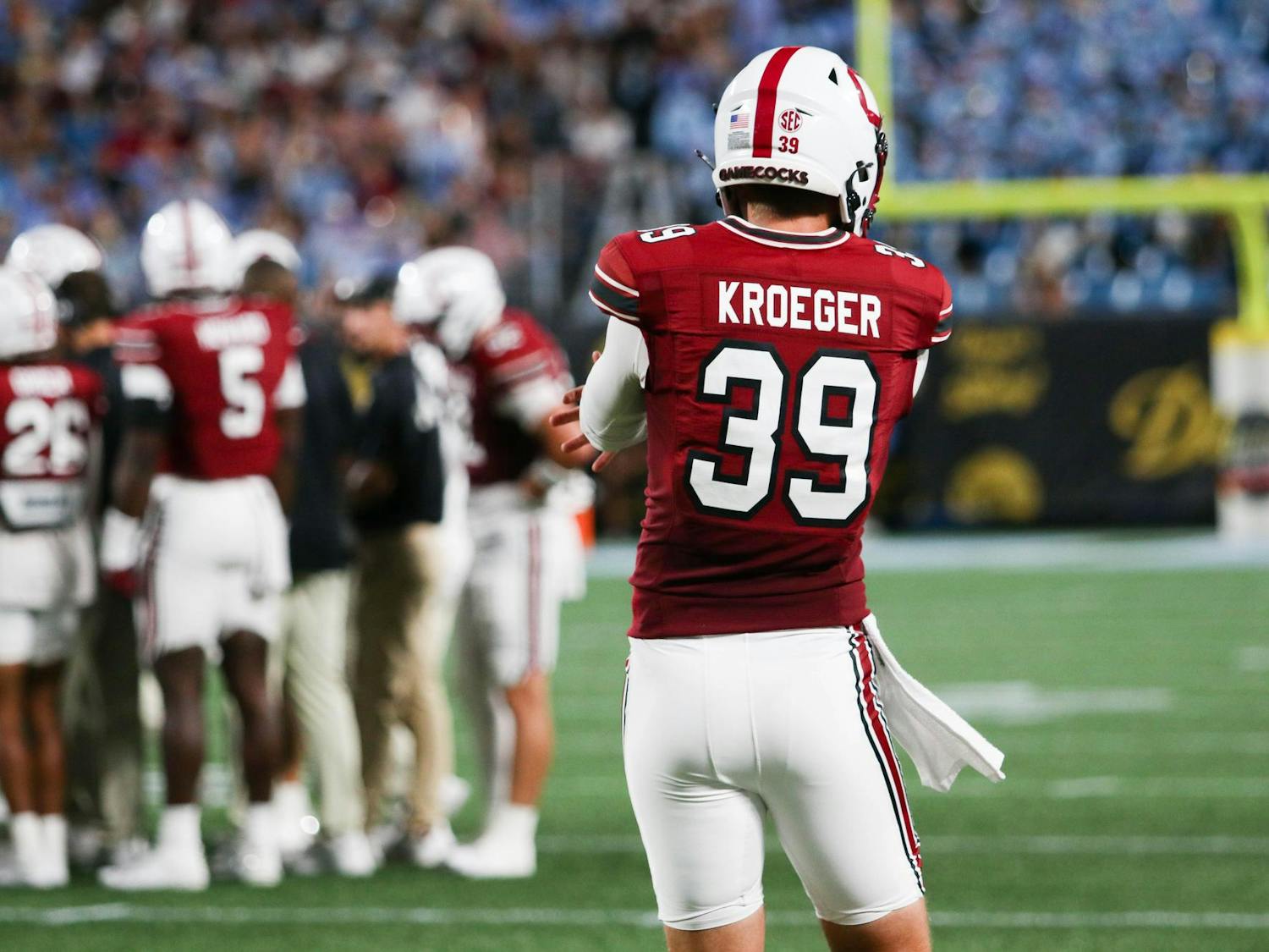 Senior punter Kai Kroeger practices on the sidelines during a timeout. Kroeger had five punts with an average of 48.4 yards during the Gamecocks' matchup against the Tar Heels.