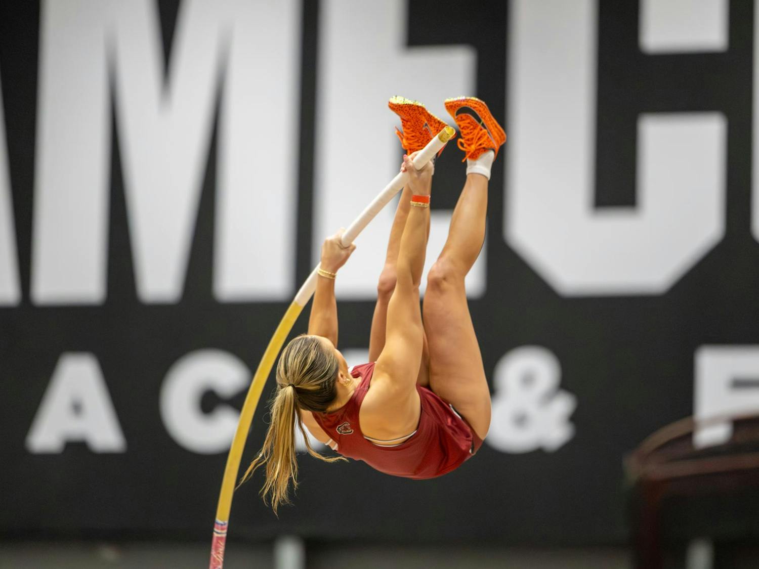 Freshman pole vaulter Bella Leonard swings up towards the bar during the women's pole vault at the Carolina Classic track and field meet on Feb. 7, 2026. Leonard's peak was 3.68 meters, and she came in third place.