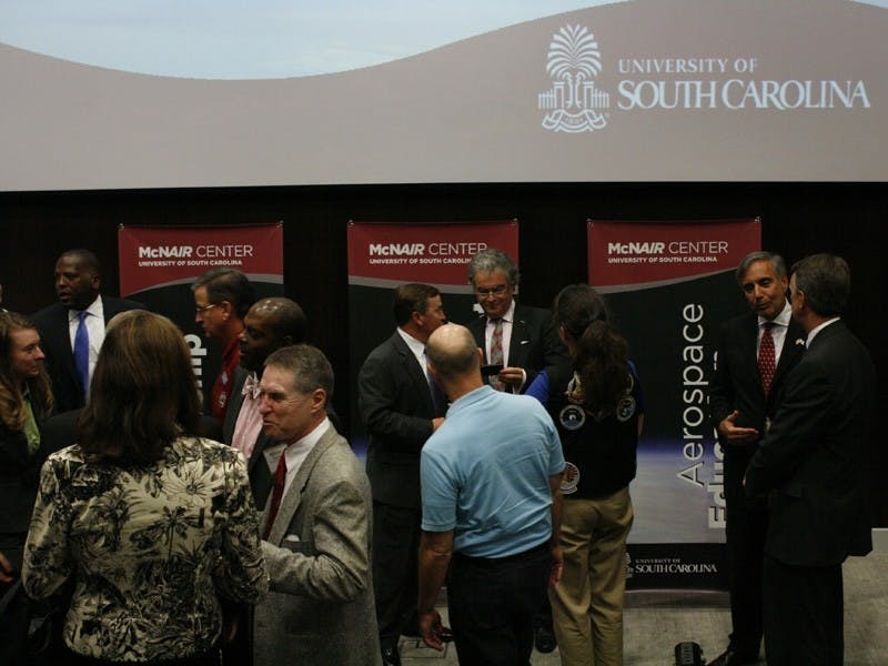 Officials from USC and the McNair center gather for the announcement of a $5 million donation Thursday.