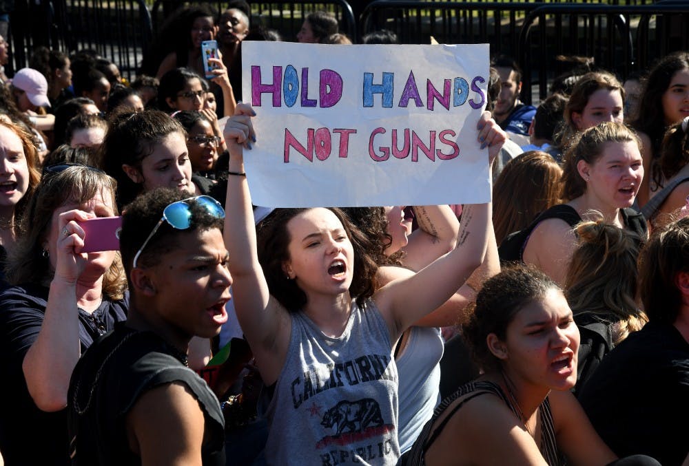 Hundreds of high school and middle school students gather in front of the White House in support of gun control in the wake of the Florida shooting, on Wednesday, Feb. 21, 2018. (Olivier Douliery/Abaca Press/TNS)