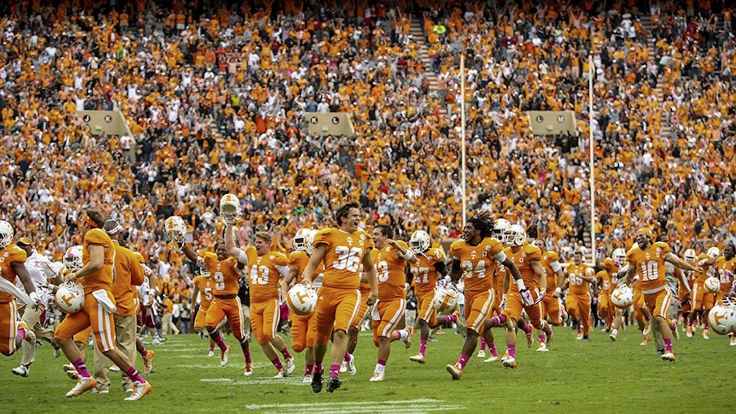 Players celebrate after Tennessee kicked the game-winning field goal. The Tennessee Volunteers defeated the South Carolina Gamecocks, 23-21, at Neyland Stadium in Knoxville, Tennessee, on Saturday, October 19, 2013. (Tim Dominick/The State/MCT)