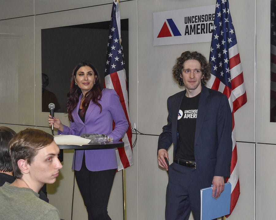 A photo of Conservative activist Laura Loomer (left) and founder of Uncensored America Sean Semanko (right) at Loomer’s speaking event in Russell House on April 18, 2023.