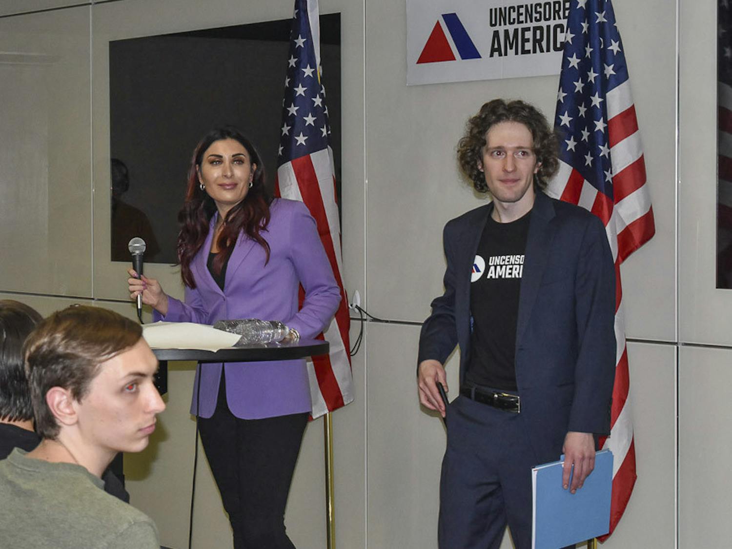 A photo of Conservative activist Laura Loomer (left) and founder of Uncensored America Sean Semanko (right) at Loomer’s speaking event in Russell House on April 18, 2023.