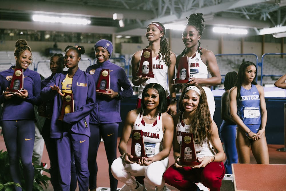 <p>University of South Carolina Track &amp; Field team hold awards at the 2022 D1 Indoor Nationals at the Crossplex in Birmingham, Alabama.</p>
