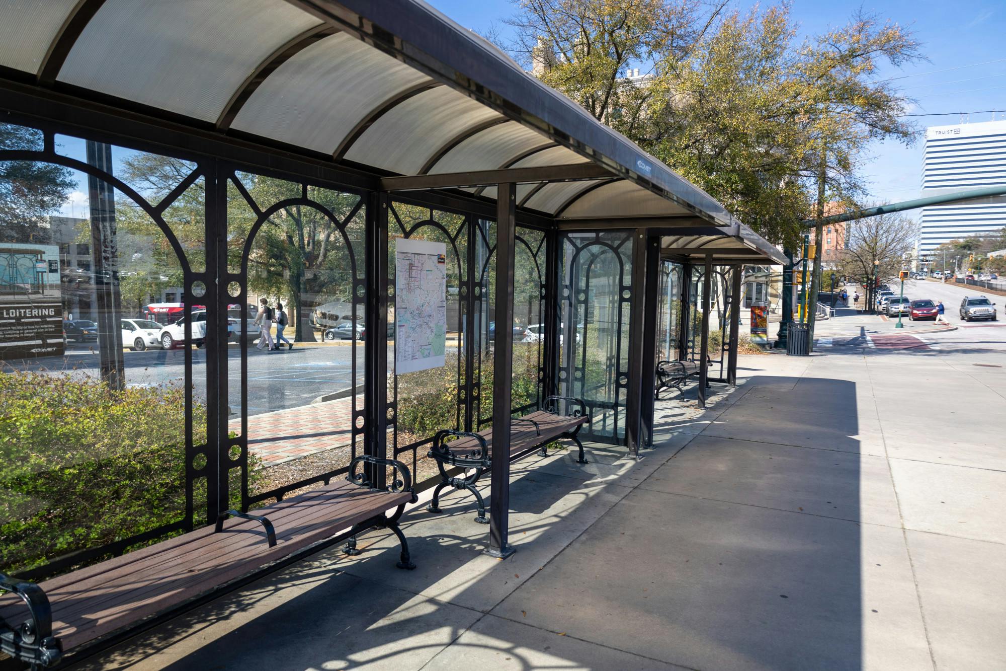 Sitting at the intersection between Assembly Street and College Street, the Comet bus stop is seen with bars in the middle of the benches on Feb. 23, 2023. The extra bar is seen as a way for the local authorities to stop people from being able to lay down on the benches. &nbsp;