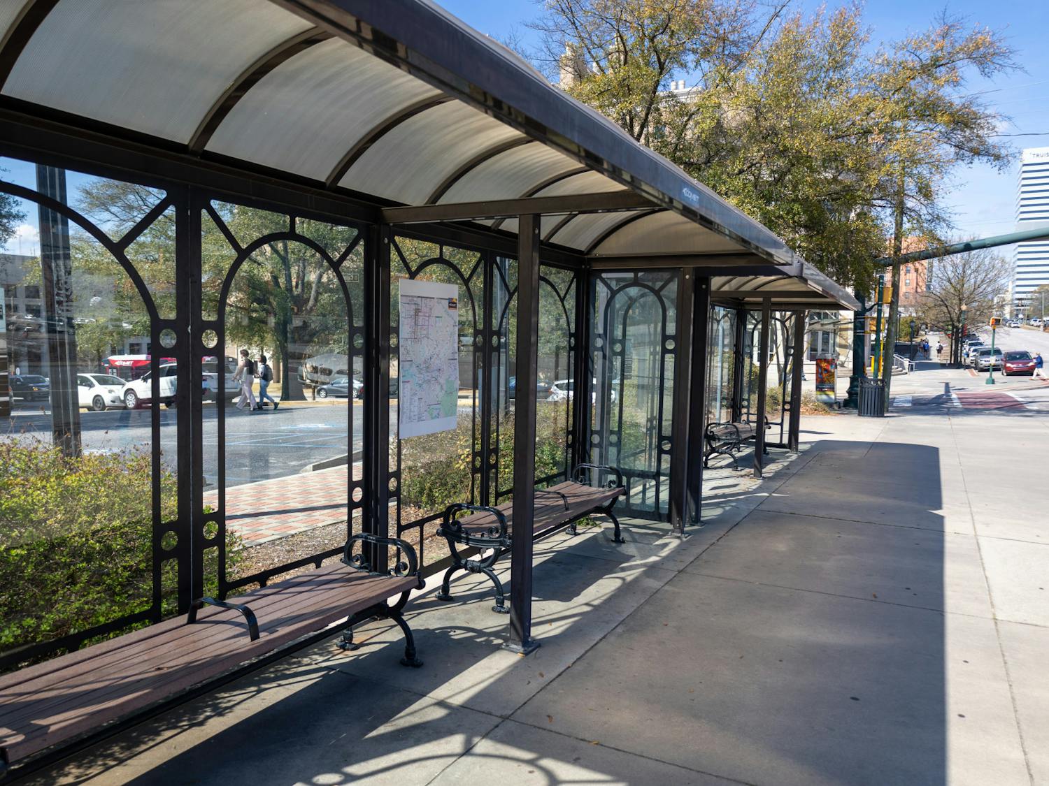 Sitting at the intersection between Assembly Street and College Street, the Comet bus stop is seen with bars in the middle of the benches on Feb. 23, 2023. The extra bar is seen as a way for the local authorities to stop people from being able to lay down on the benches. &nbsp;