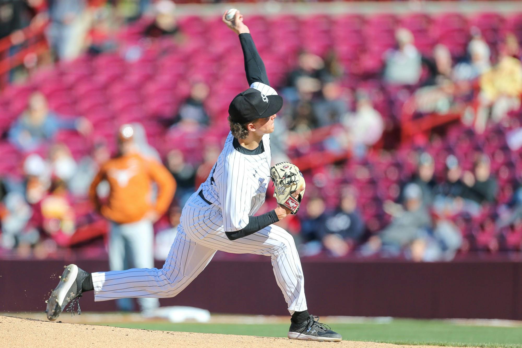 FILE— Freshman Left-Handed pitcher Matthew Becker pitches ball.
