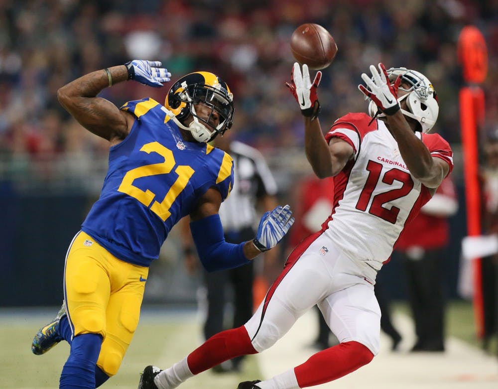 Arizona Cardinals wide receiver John Brown is unable to catch a pass down the sideline as he is defended by St. Louis Rams cornerback Janoris Jenkins during first quarter action on Sunday, Dec. 6, 2015, at Edward Jones Dome in St. Louis. (Chris Lee/St. Louis Post-Dispatch/TNS)