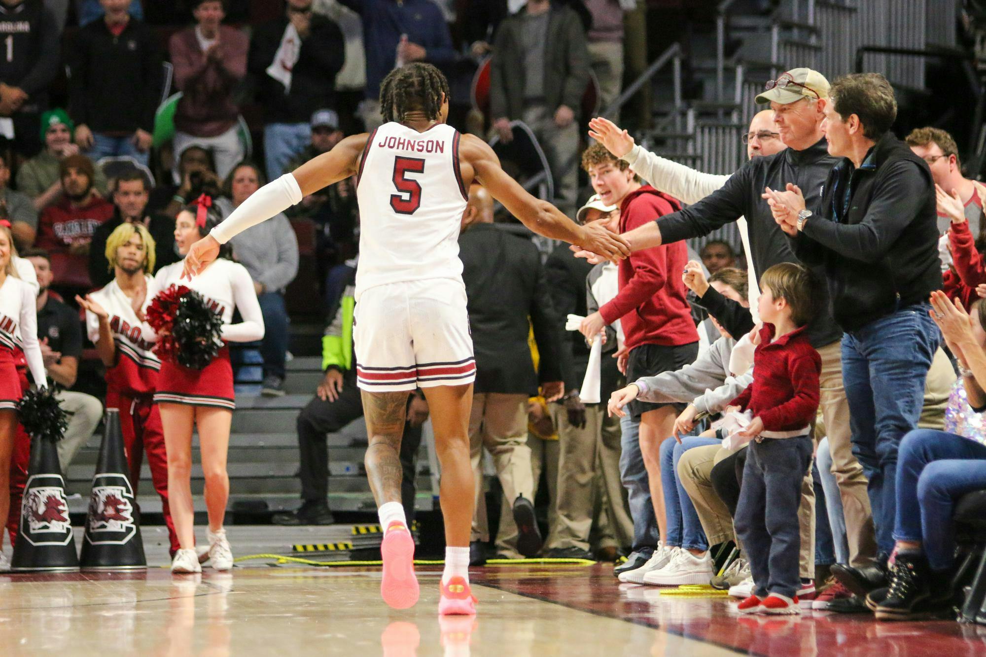 FILE — Then-junior guard Meechie Johnson high-fives the crowd in celebration on Jan. 6, 2024. Johnson originally played for Ohio State for two seasons, South Carolina for his sophomore and junior seasons, Ohio State for his senior season, and now South Carolina as a redshirt senior.