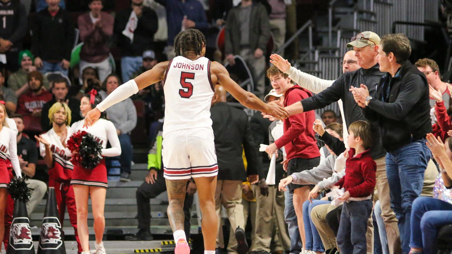 FILE — Then-junior guard Meechie Johnson high-fives the crowd in celebration on Jan. 6, 2024. Johnson originally played for Ohio State for two seasons, South Carolina for his sophomore and junior seasons, Ohio State for his senior season, and now South Carolina as a redshirt senior.