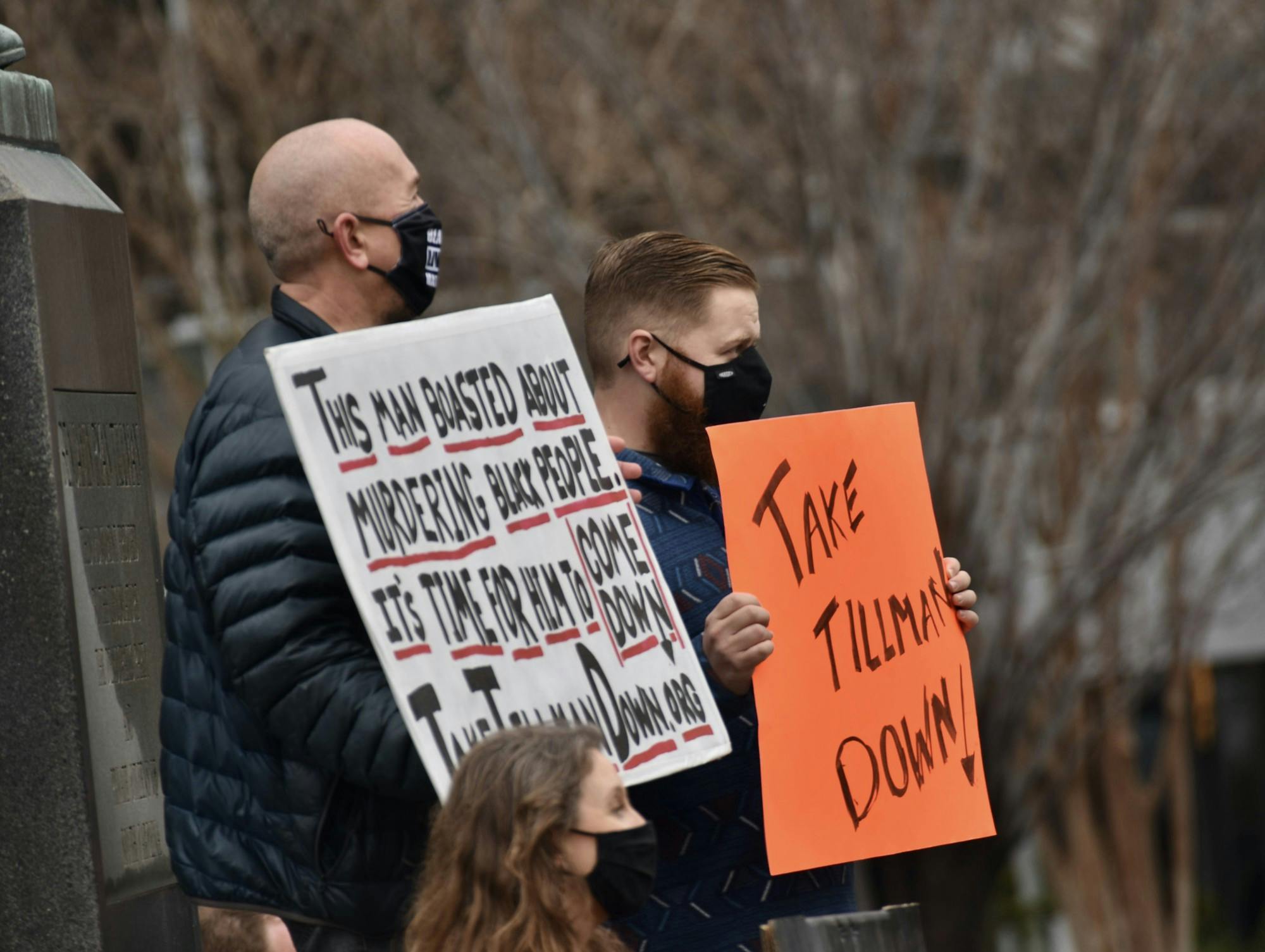 Protestors stand in front of the Benjamin Tillman statue located at the South Carolina Statehouse. The protestors called for the removal of the statue based on Benjamin Tillman's history.