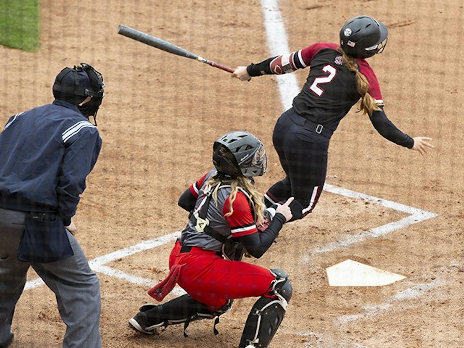  Graduate infielder Kenzi Maguire prepares to run after swinging at a ball from the opposing pitcher. South Carolina won 8-0 against Gardner-Webb University. 