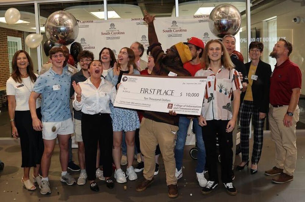 <p>The winning team from the Call for Code: IBM watsonx workshop, stand in the lobby of the School for Journalism and Mass Communications on Sept. 28, 2024. The College of Information and Communication hosted the competition.</p>