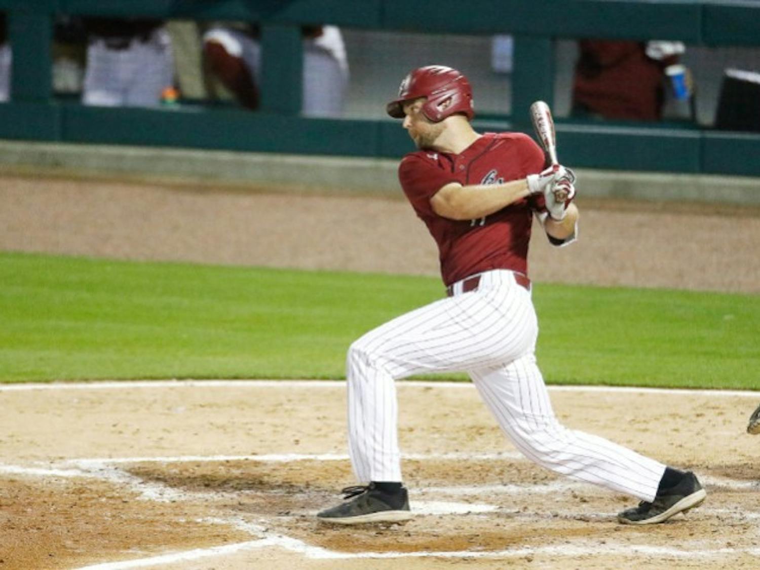Senior right fielder Andrew Eyster swings at a pitch during Tuesday's game against UNC. The Gamecocks fell to the Tar Heels 3-2 in 10 innings.