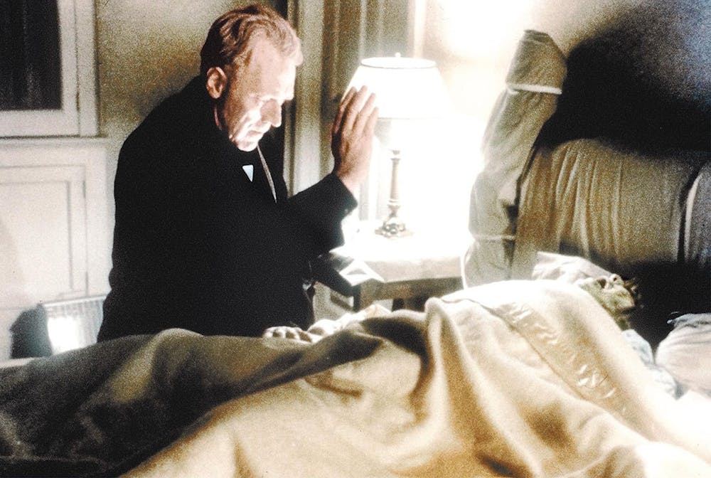 <p>Father Merrin, played by Max von Sydow, seeks the inner demon in Regan (Linda Blair) in the 1973 film “The Exorcist.”</p>