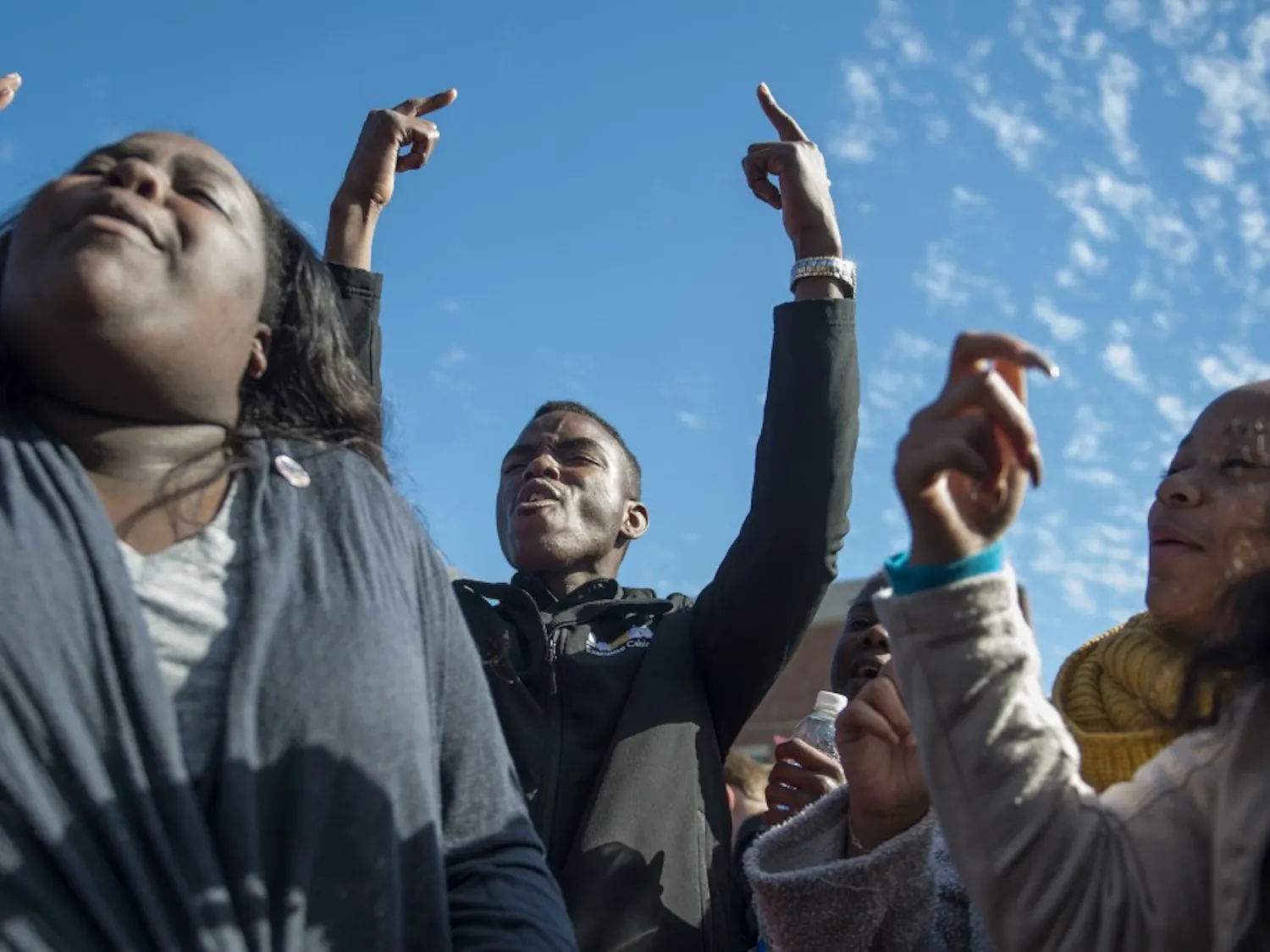 Peyton Head rejoices after hearing news of UM System President Tim Wolfe's resignation during the Concerned Students 1950 protest on Monday, Nov. 9 2015, in Columbia, Mo.