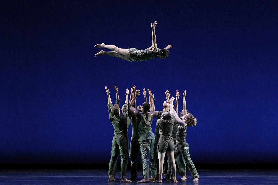 Members of the Bill T. Jones/Arnie Zane Company prepare to catch one of its dancers during the performance of Jones' "D-Man in the Waters." The dance group is working with the USC Dance Company to put together a show titled "Story/Time" that will debut at the Koger Center on April 1 and 2, 2023.