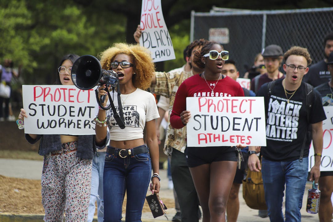 Fourth-year broadcast journalism student Courtney McClain marches with USC students from Davis Field to the Statehouse on April 5, 2023. McClain spoke on topics concerning protecting student workers and student-athletes and making the groups' voices heard.&nbsp;