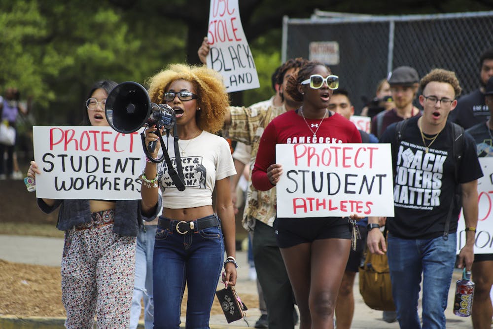 <p>Fourth-year broadcast journalism student Courtney McClain marches with USC students from Davis Field to the Statehouse on April 5, 2023. McClain spoke on topics concerning protecting student workers and student-athletes and making the groups' voices heard.&nbsp;</p>