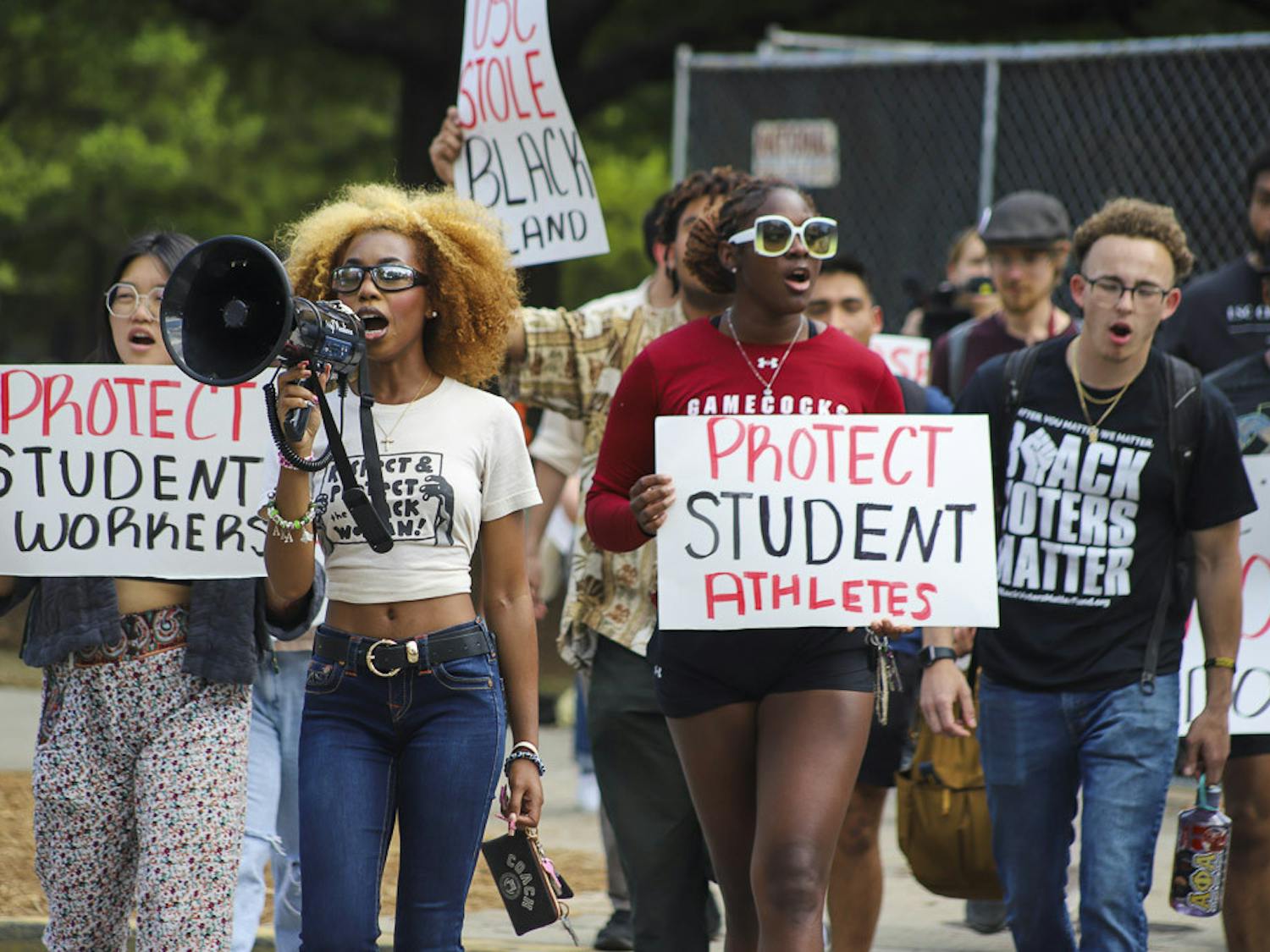 Fourth-year broadcast journalism student Courtney McClain marches with USC students from Davis Field to the Statehouse on April 5, 2023. McClain spoke on topics concerning protecting student workers and student-athletes and making the groups' voices heard.&nbsp;