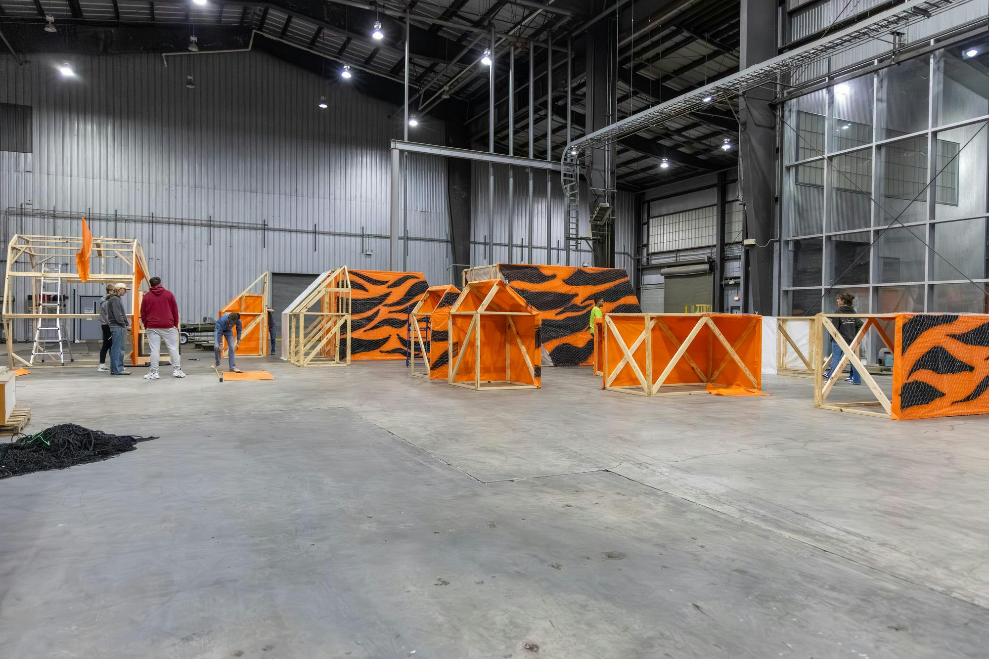 Various sections of the Tiger Burn statue in the biomass warehouse next to the Molinaroli College of Engineering on Nov. 10, 2025. Students from the school spend weeks designing and building the 34-foot-tall statue that was burned down.