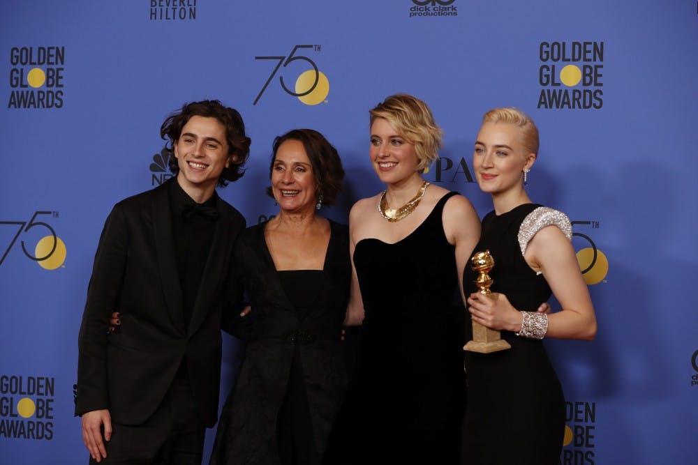 From left, Timothee Chalamet, Laurie Metcalf, Greta Gerwig and Saoirse Ronan backstage at the 75th Annual Golden Globes at the Beverly Hilton Hotel in Beverly Hills, Calif., on Sunday, Jan. 7, 2018. (Allen J. Schaben/Los Angeles Times/TNS)
