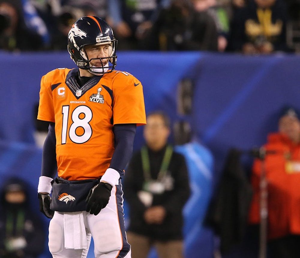 Peyton Manning (18) of the Denver Broncos reacts after a play during the second half of Super Bowl XLVIII against the Seattle Seahawks at MetLife Stadium in East Rutherford, N.J., on Sunday, Feb. 2, 2014. (Lionel Hahn/Abaca Press/MCT)
