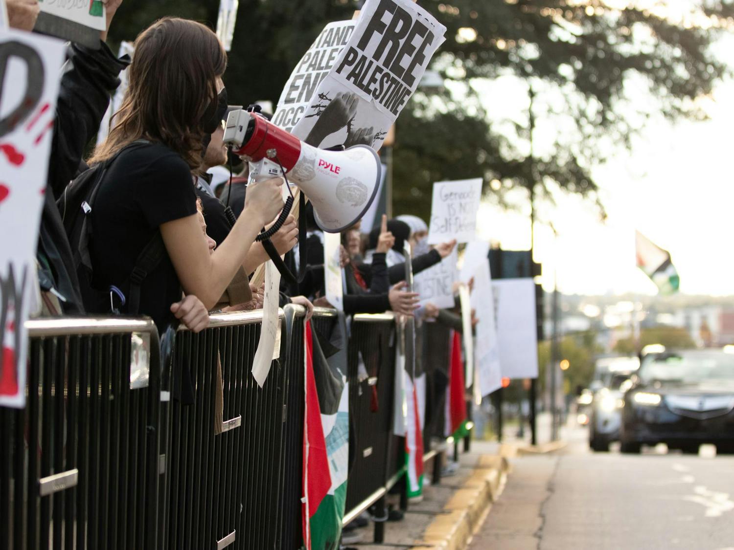 Protestors stand overlooking Gervais Street in Columbia, S.C., shouting chants like "Free free Palestine" in anticipation of the Free Palestine Emergency Demonstration at the Statehouse. The rally was held by the North and South Carolina Party for Social Liberation on Oct. 17, 2023.