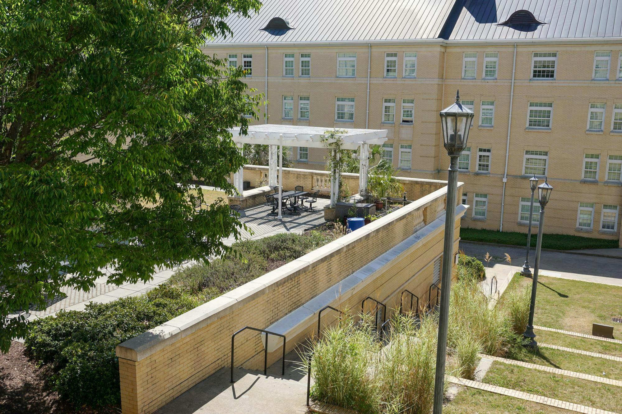 The terrace of Green Quad residence hall shown on April 20, 2026. Student Government seeks to increase green spaces and sustainability around campus.