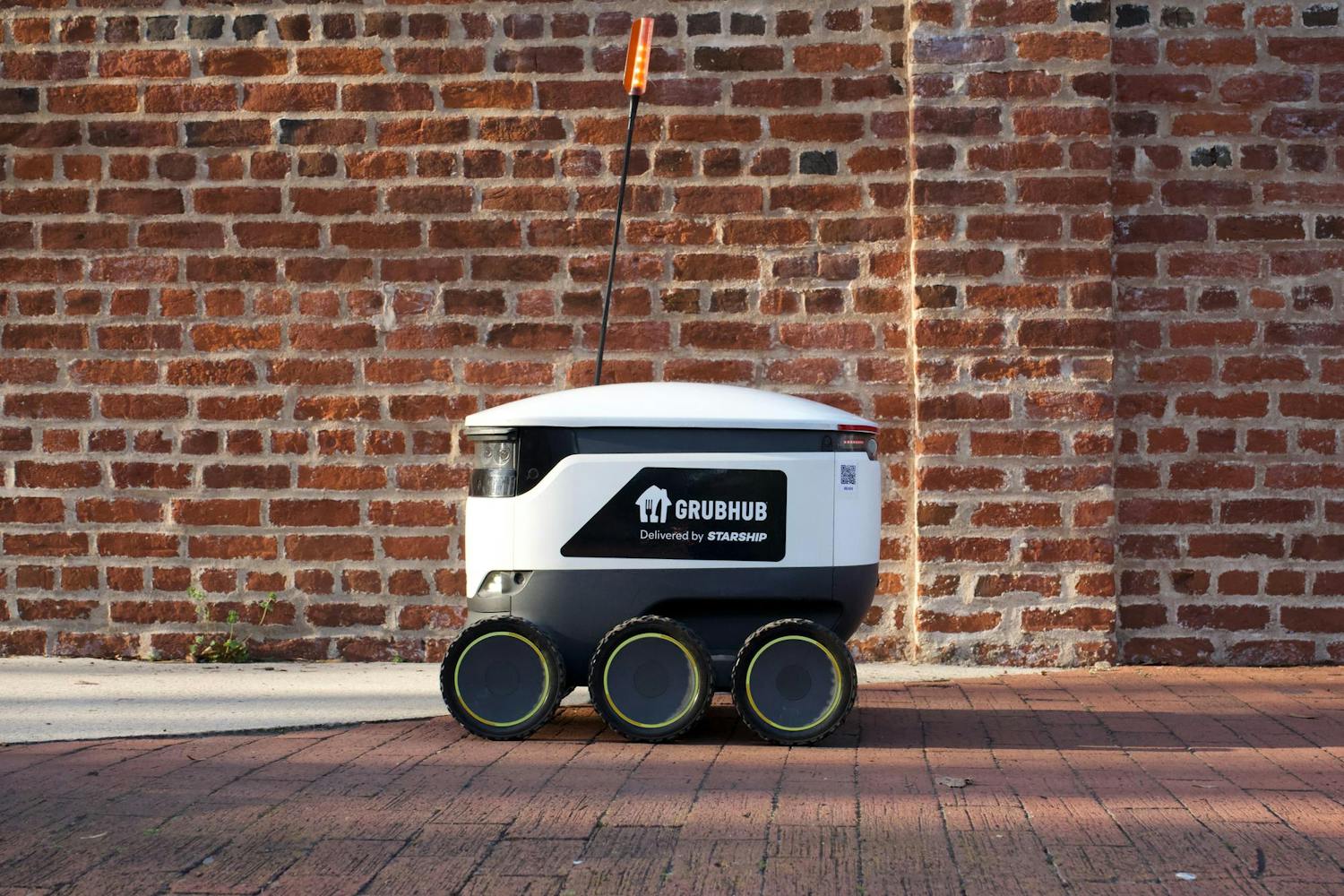 A University of South Carolina Grubhub robot zooming along Greene Street on Feb. 25, 2024. The university has implemented a new food delivery system for ɫɫƵs to use on campus where small, six-wheeled robots deliver them food at their request if ordered through the Grubhub app.