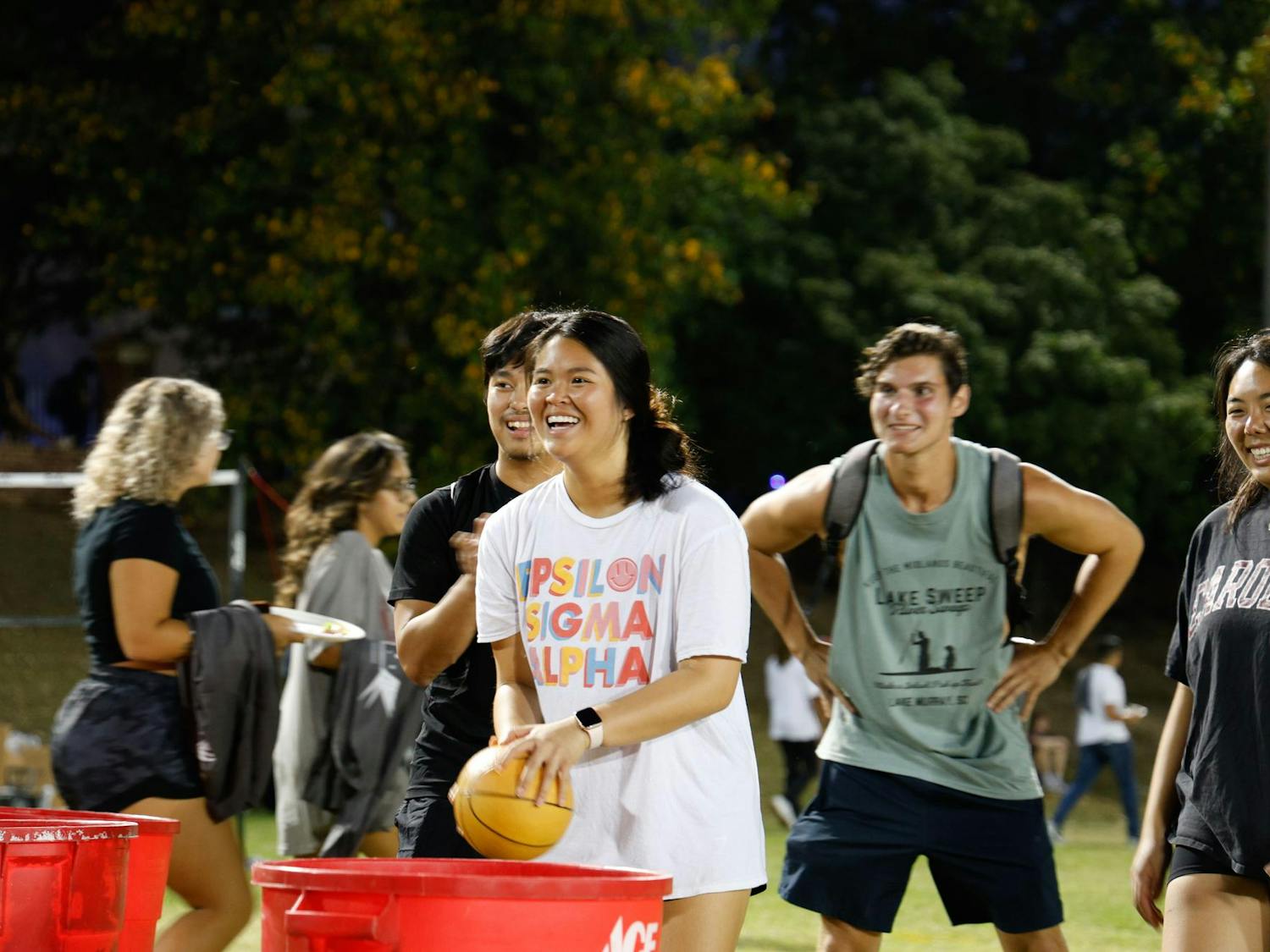 A student prepares to make a shot in a game of giant cup pong at Blatt Bonanza on Sept. 18, 2024, at Blatt Field. Students participated in several activities during the three-hour event.