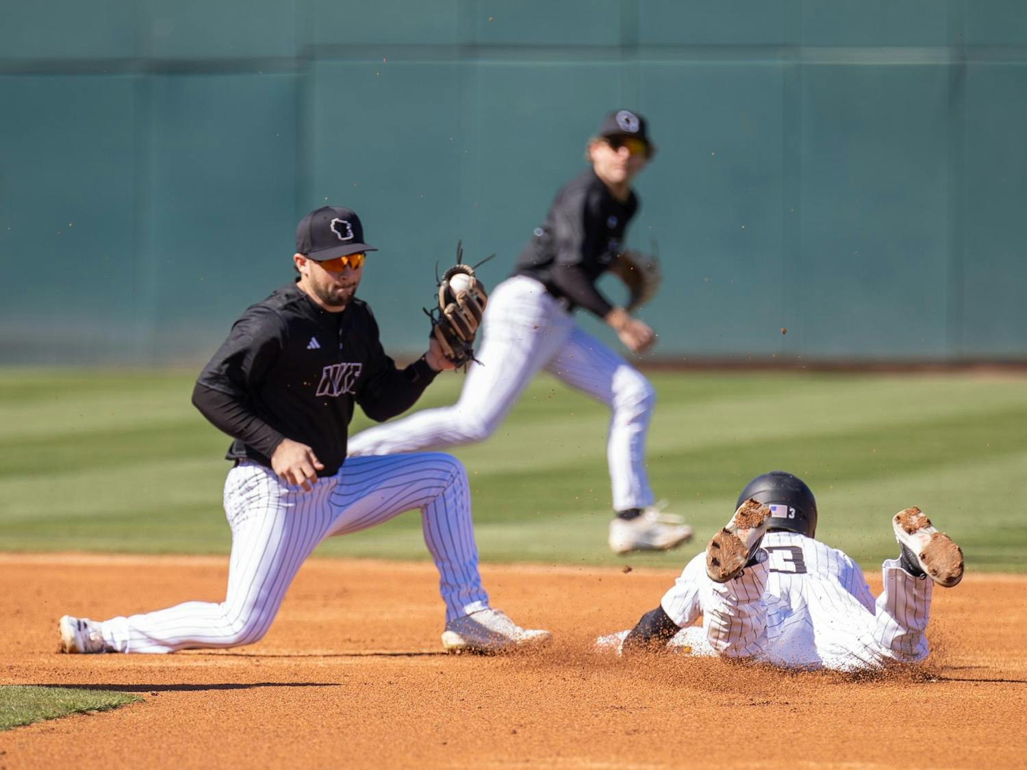 Senior outfielder Dalton Mashore slides into second base on a steal against Milwaukee on Feb. 22, 2025 at Founders Park. The Gamecocks defeated the Panthers 6-3, and later went on to win the series 3-0.
