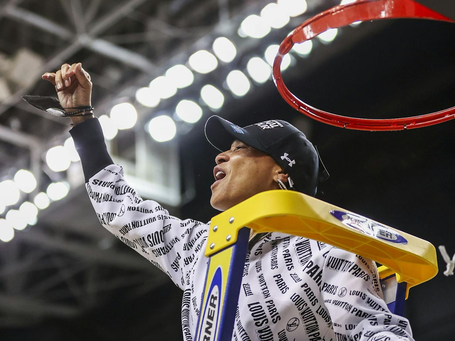 Head Coach Dawn Staley celebrates South Carolina's 80-50 victory over Creighton in the Elite Eight on Sunday, March 27, 2022. The win propelled the team to the Final Four.&nbsp;