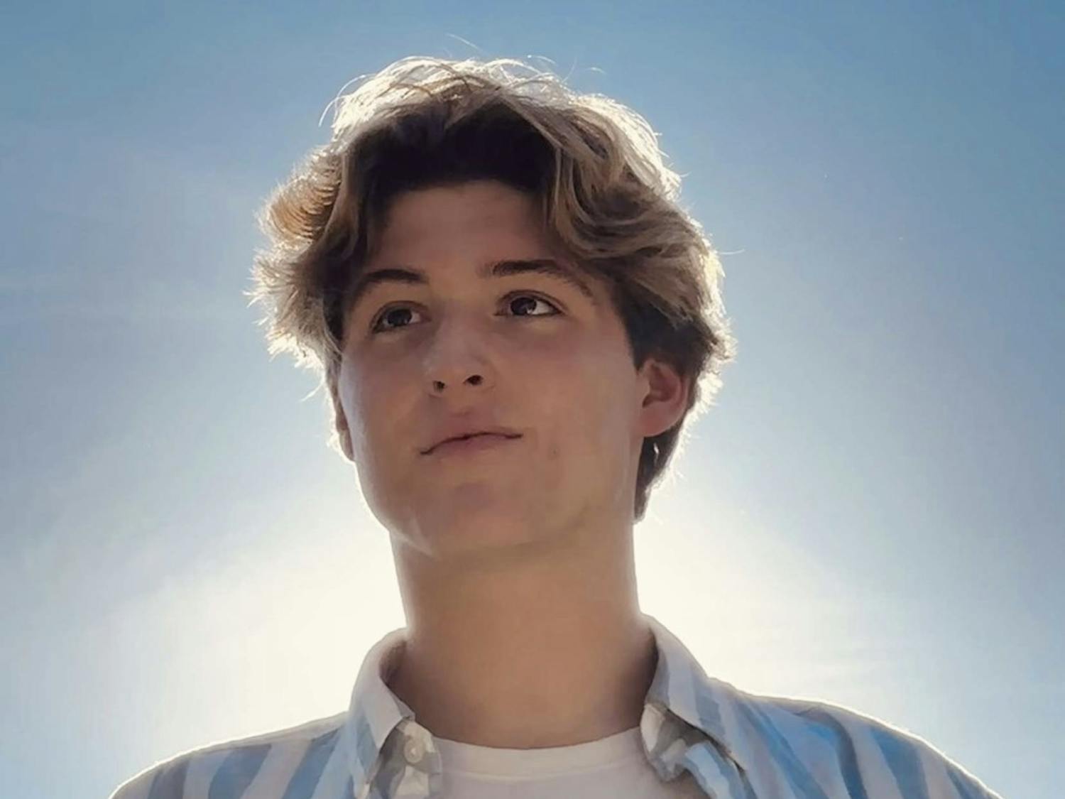 A photo portrait of high school student musician David Vandelay of the South Carolina Governor’s School for the Arts and Humanities in Greenville, South Carolina. The Columbia native comes home on the weekends to perform at Soda City, which he has done since he was a young child. 