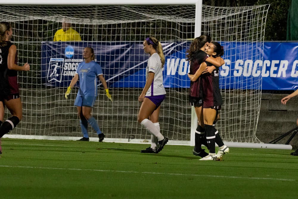 <p>Junior midfielder Lily Render hugs senior forward Corinna Zullo in celebration of Render's second goal of the game against James Madison on Nov. 10, 2023. With the win, the Gamecocks advanced to the second round of the Women's College Cup, and Render now has four goals on the 鶹С򽴫ý.</p>