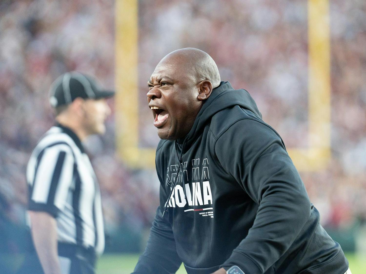 Executive Director of Character and Player Development Derrick Moore hypes up the players and the crowd as the team takes the lead in its game against Missouri. The Gamecocks were up 21-6 at halftime.