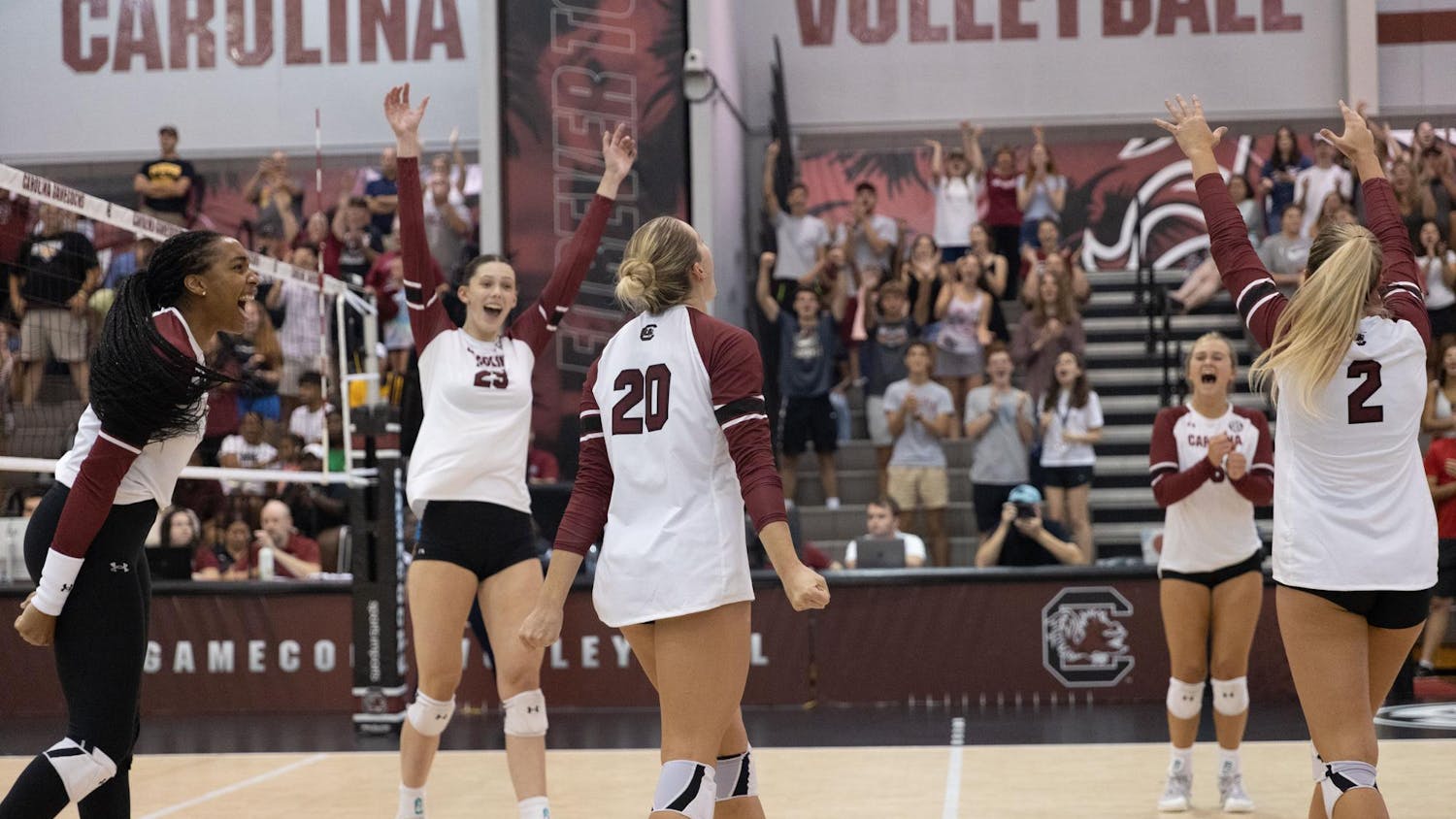 The USC women's volleyball team celebrates earning a point during its match against Towson University on Aug. 26. The Gamecocks defeated the Tigers 3-1 after losing 3-0 earlier in the weekend.