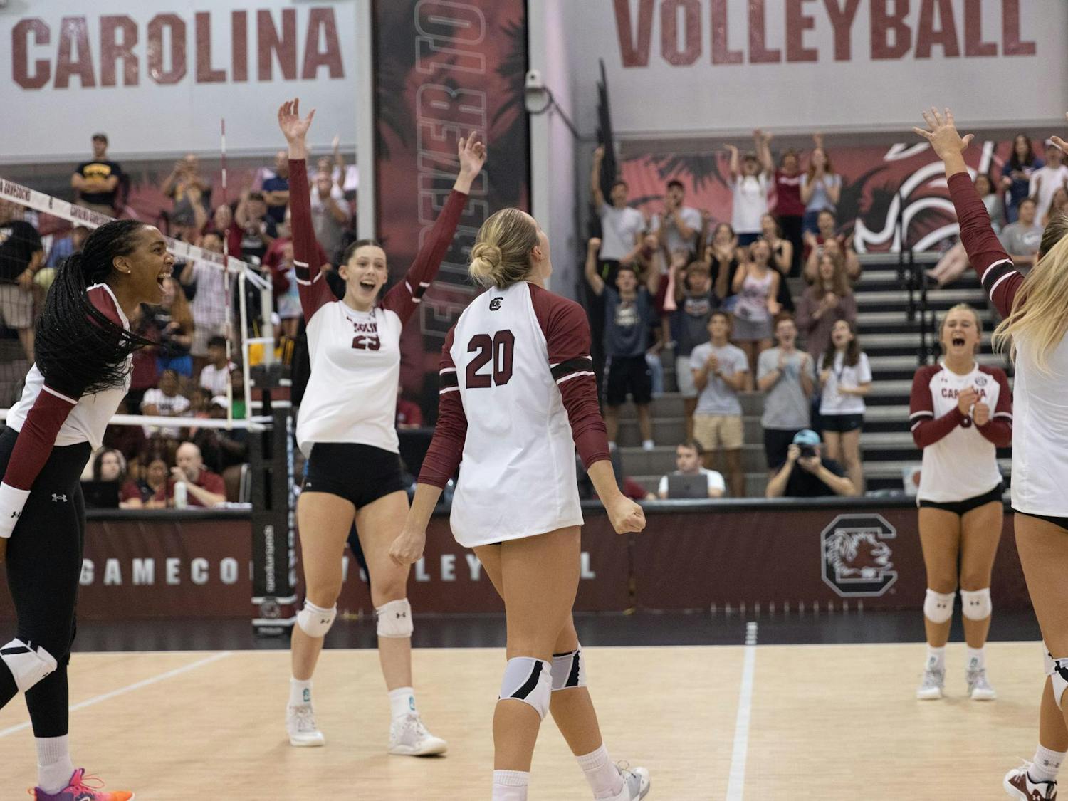 The USC women's volleyball team celebrates earning a point during its match against Towson University on Aug. 26. The Gamecocks defeated the Tigers 3-1 after losing 3-0 earlier in the weekend.