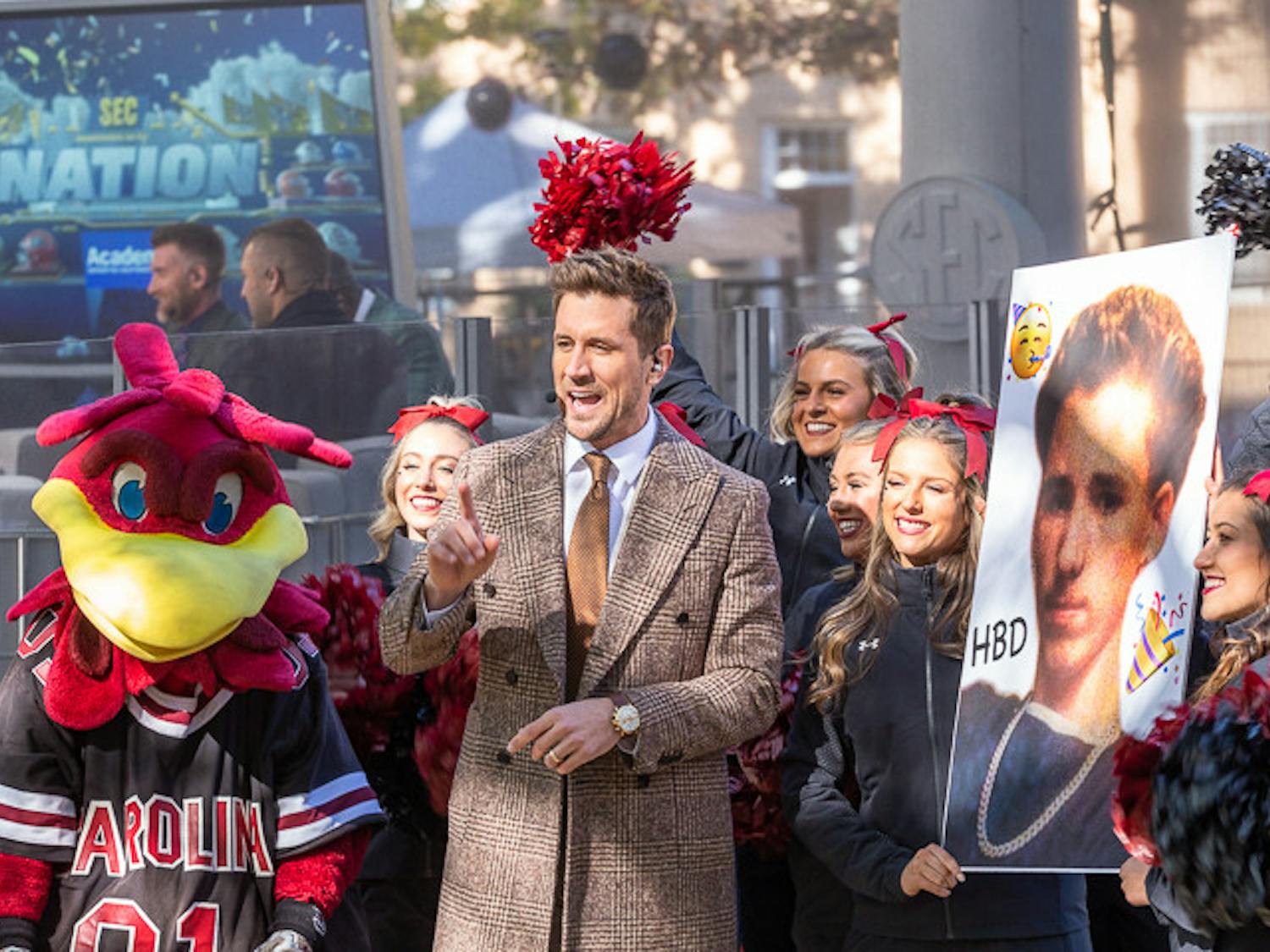 Jordan Rodgers poses with Cocky and the USC cheer team during the SEC Morning Show on Nov. 19, 2022. Rodgers is a sports commentator and played quarterback for the Vanderbilt Commodores and the Jacksonville Jaguars.