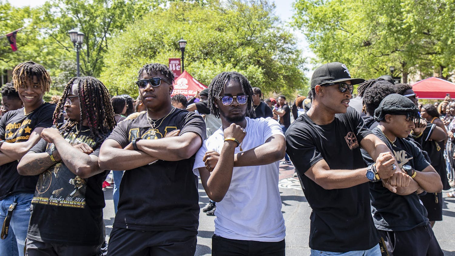 Members of the Alpha Phi Alpha fraternity step to the music during their weekly Hip Hop Wednesday event on Greene Street. The event is hosted by the National Pan-Hellenic Council and allows members of the nine Black fraternities and sororities on campus to come together and share their culture.