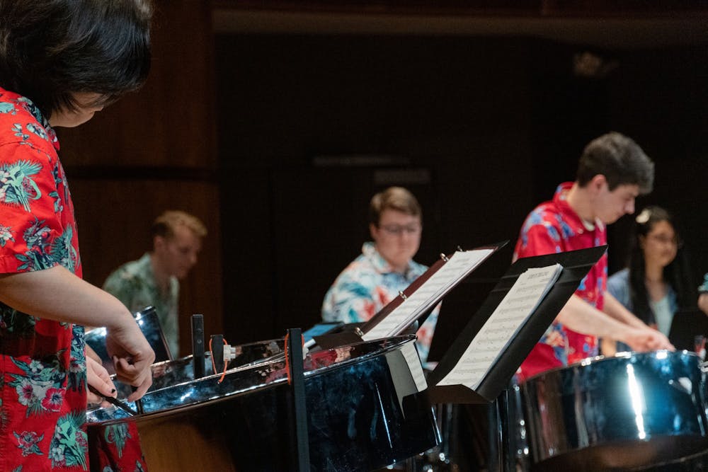The Palmetto Pans bang against steel pan drums during a concert at the USC School of Music Tuesday evening, April 5, 2022. The music group composed of USC students performed a variety of songs most of which were island compositions from Trinidad and Tobago.