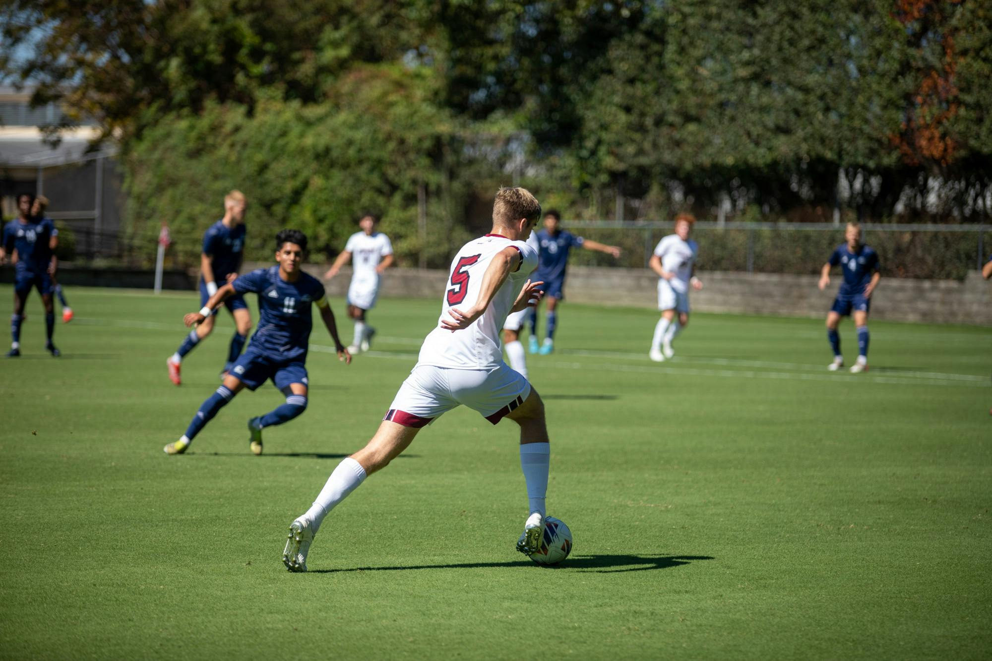 Freshman defender William Nilsson, runs after the ball to gain control at the men’s soccer game on Saturday, Sept. 24th, 2022.