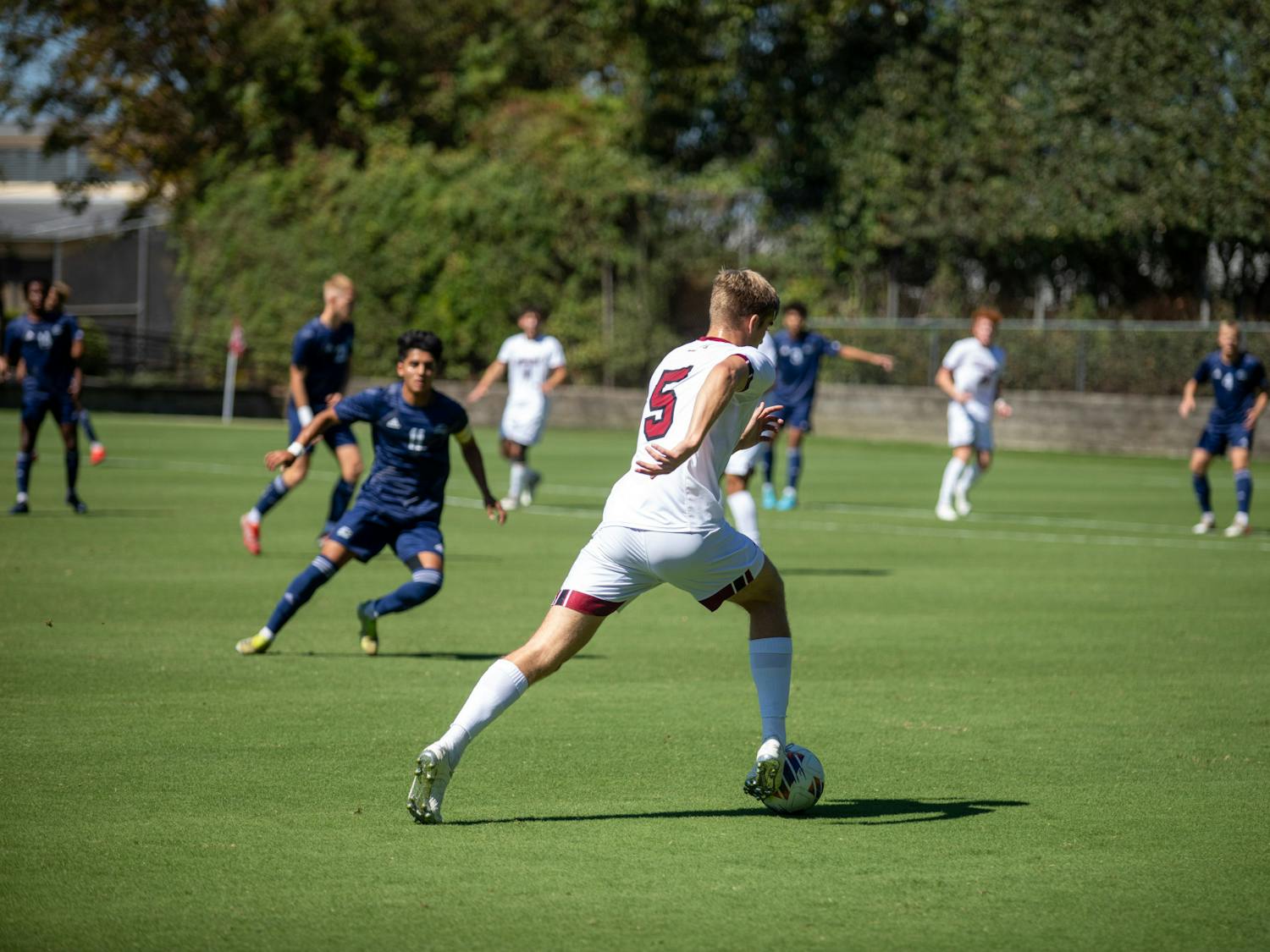 Freshman defender William Nilsson, runs after the ball to gain control at the men’s soccer game on Saturday, Sept. 24th, 2022.