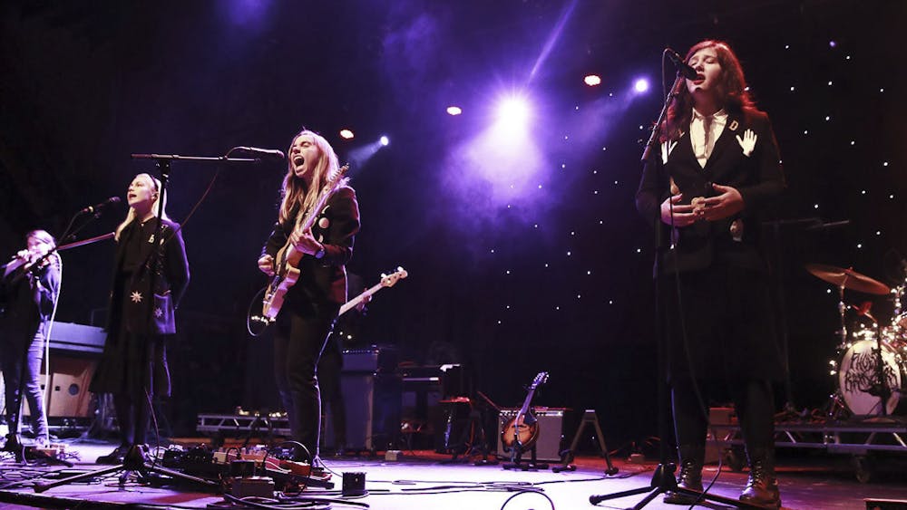 <p>Phoebe Bridgers (left), Julien Baker (center) and Lucy Dacus (right) from boygenius perform at Thalia Hall in Chicago, Ill., on Nov. 12, 2018. The indie/folk rock band's debut album, "The Record," combines deep topics with harmonic gospel and worship tones.</p>