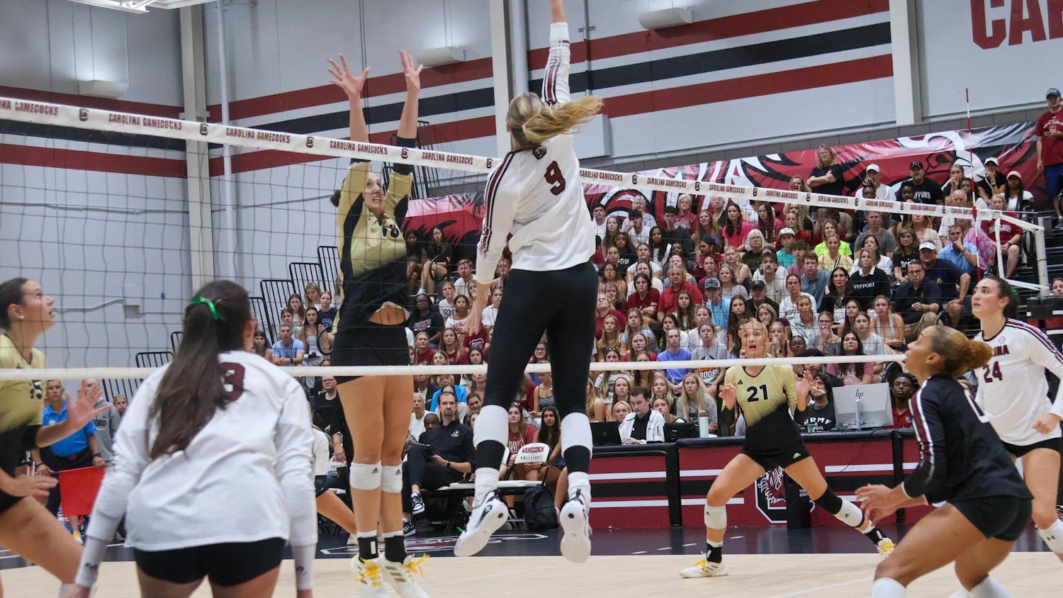 Junior middle Ava Leahy hits over the Wofford block during South Carolina's game on Sept. 15, 2025, at the Carolina Volleyball Center. Leahy recorded 7 kills in the Gamecock's 3-1 win.