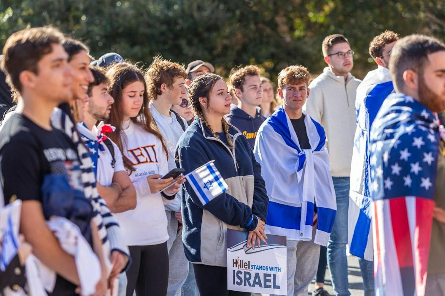 Second-year international business student Casey Fitzgerald (center) stands with other supporters during a pro-Israel rally on Greene Street on Dec. 7, 2023. Fitzgerald is president of the 鶹С򽴫ý chapter of Hillel and interns with Olami.