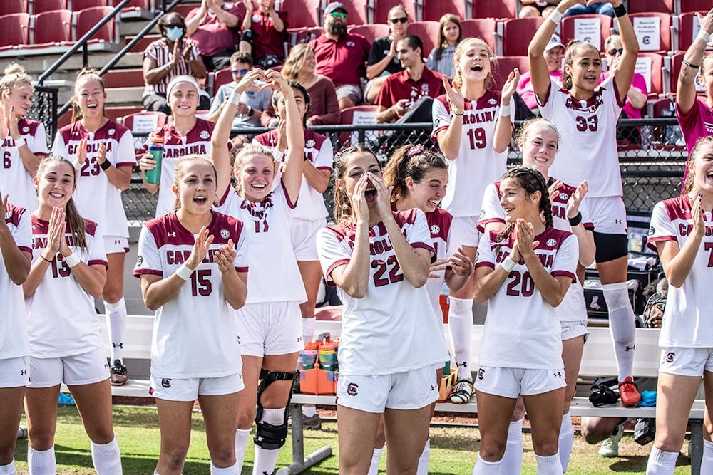 <p>Graduate forward Ryan Gareis, and her teammates cheer at the game versus the Alabama team. The Gamecocks defeated Hofstra 3-0 on Friday, Nov. 19, which advances them to the Round of 16 of the NCAA Tournament.</p>